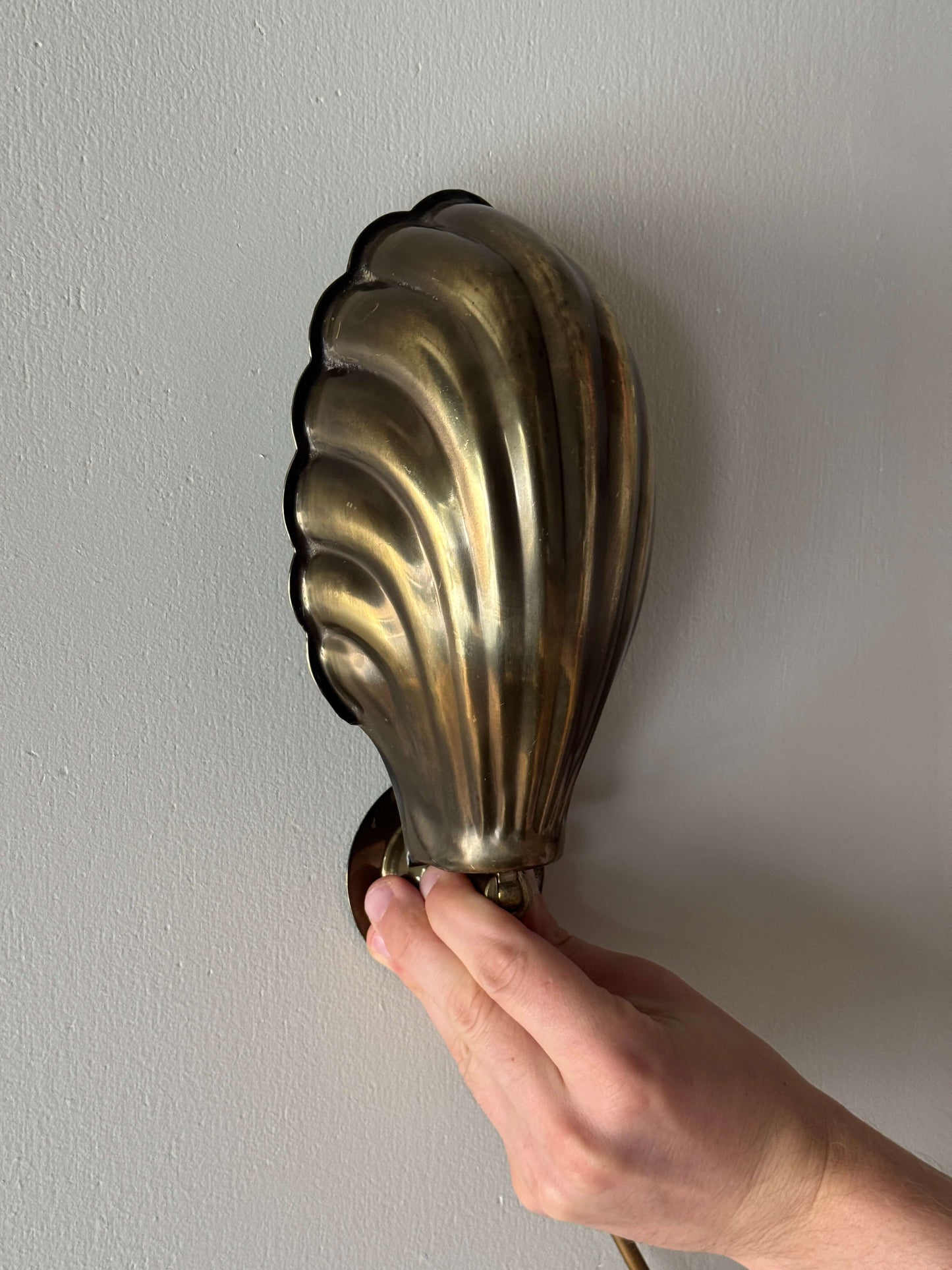 Vintage brass clam wall lights