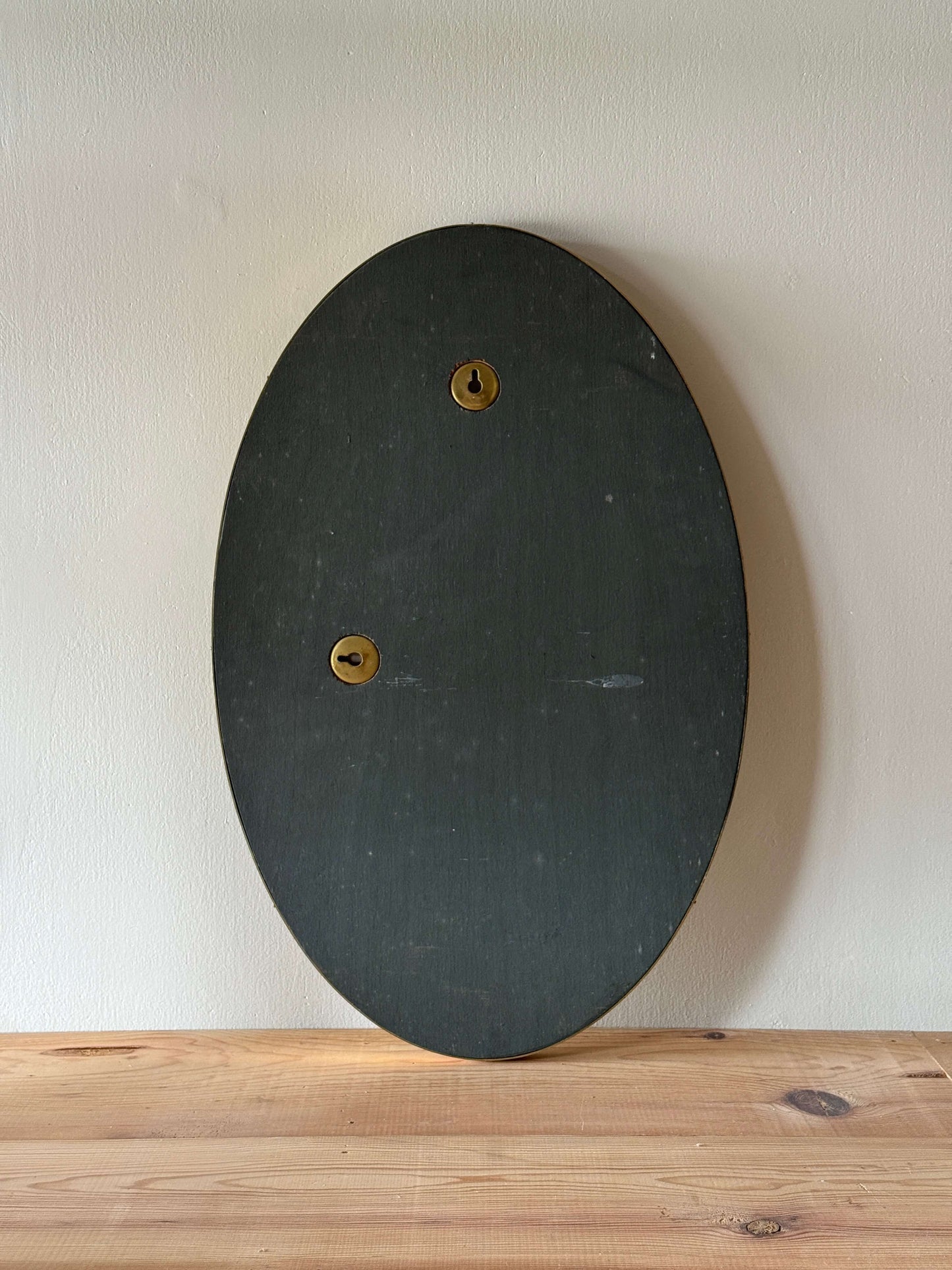 French mid-century oval brass mirror