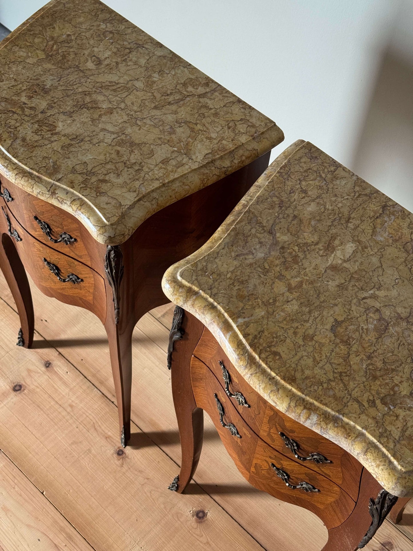 Pair of French 20th-century bedside tables with marble tops