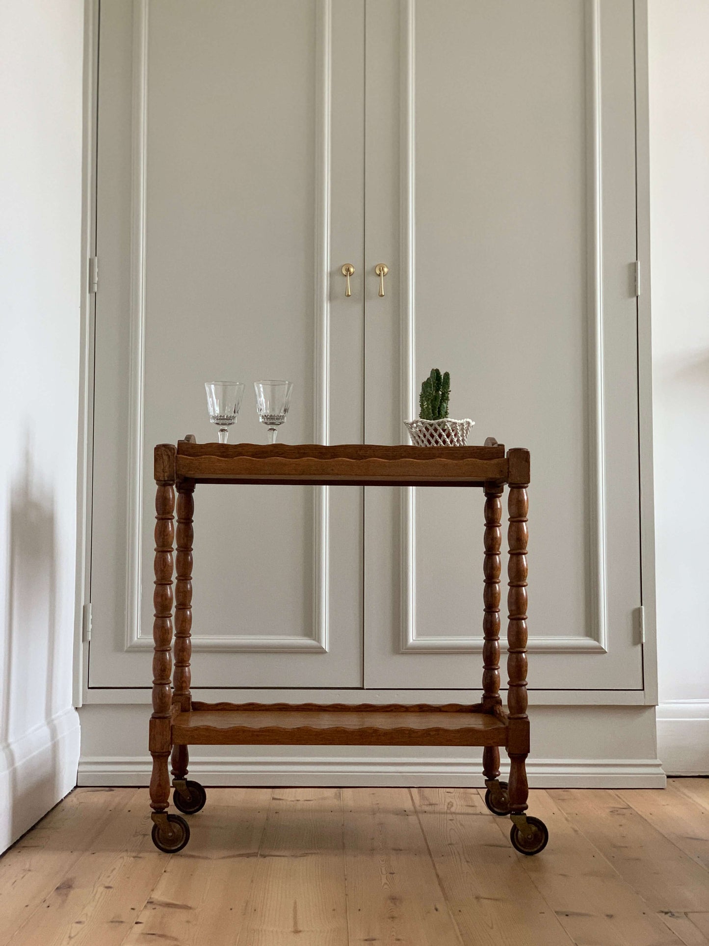 French vintage bobbin bar cart with scalloped tray