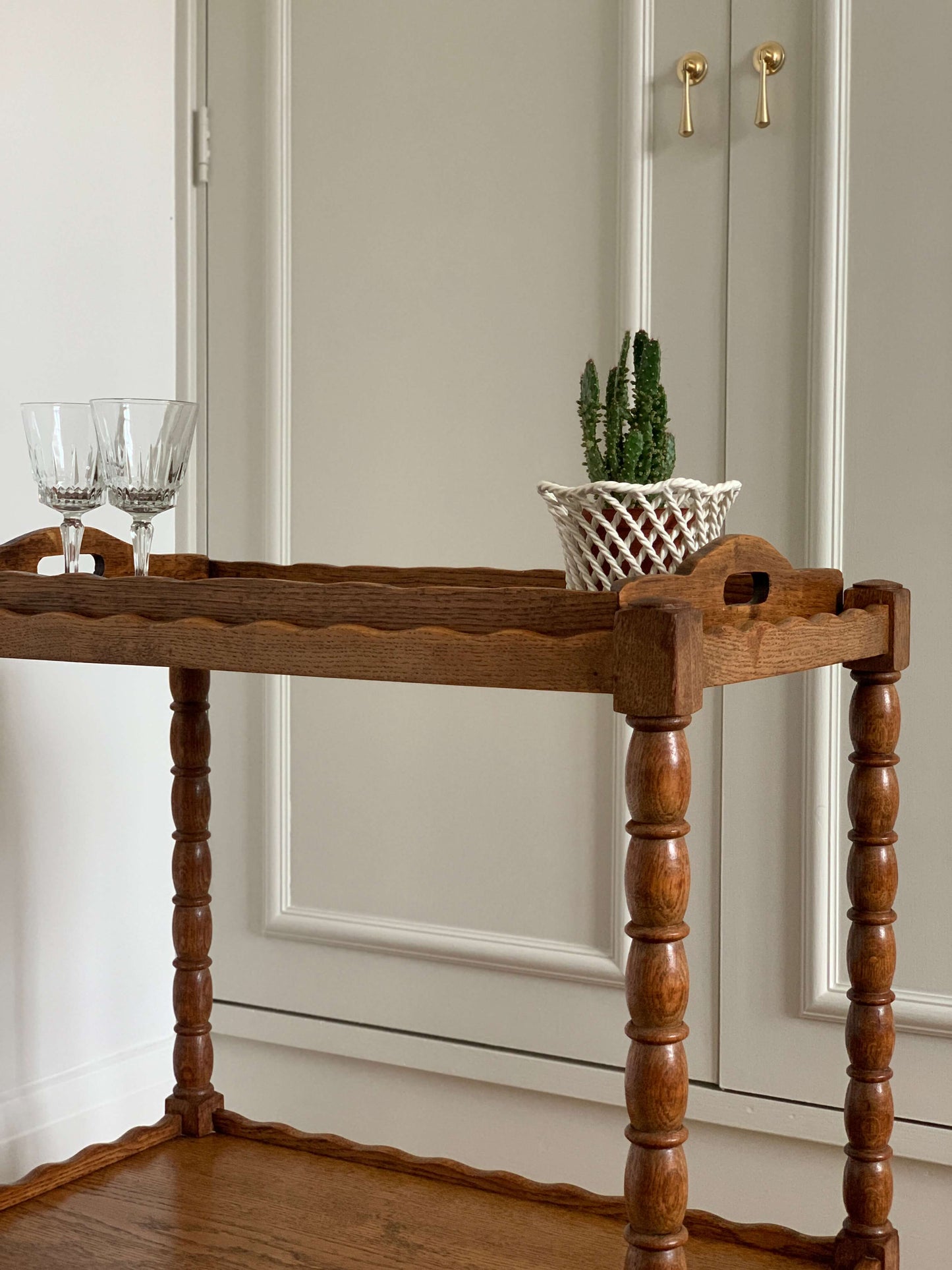 French vintage bobbin bar cart with scalloped tray