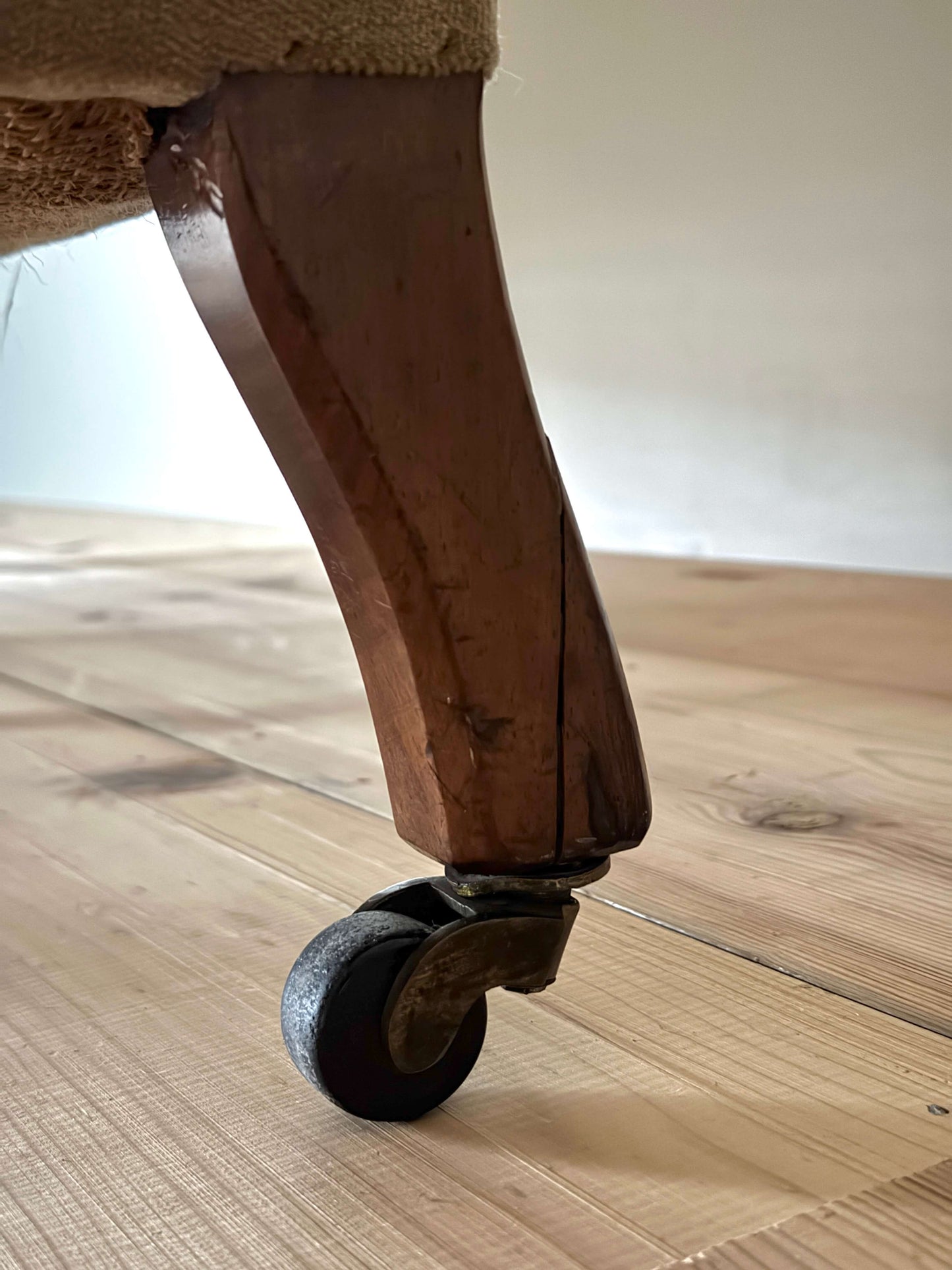 Pair of Edwardian armchairs on castors