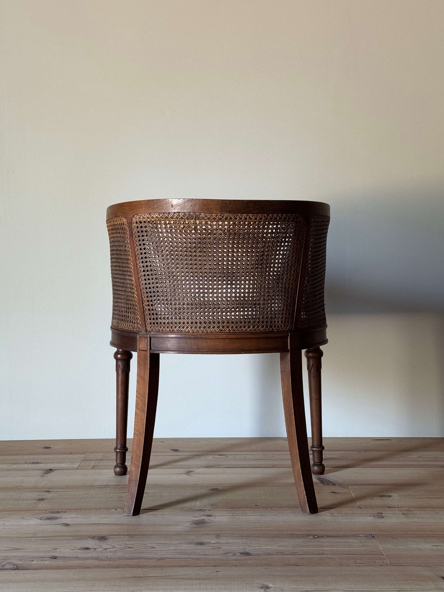 Vintage French bergère cane armchair