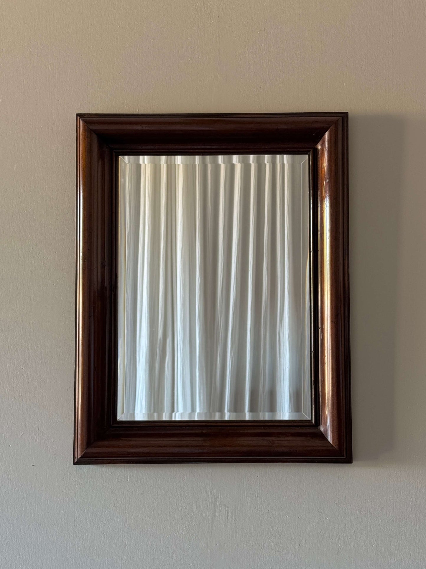 Pair of 20th-century mahogany mirrors