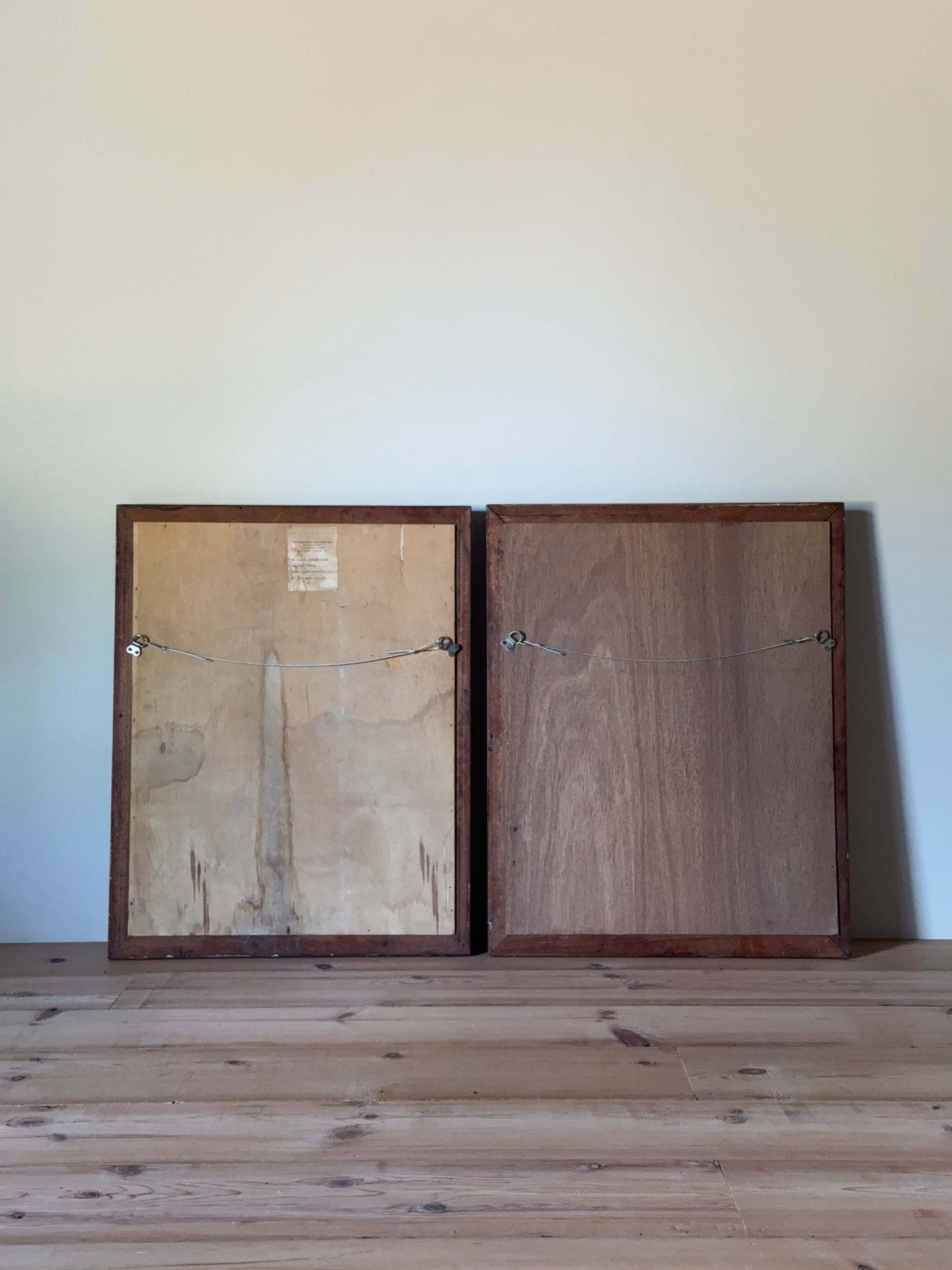 Pair of 20th-century mahogany mirrors