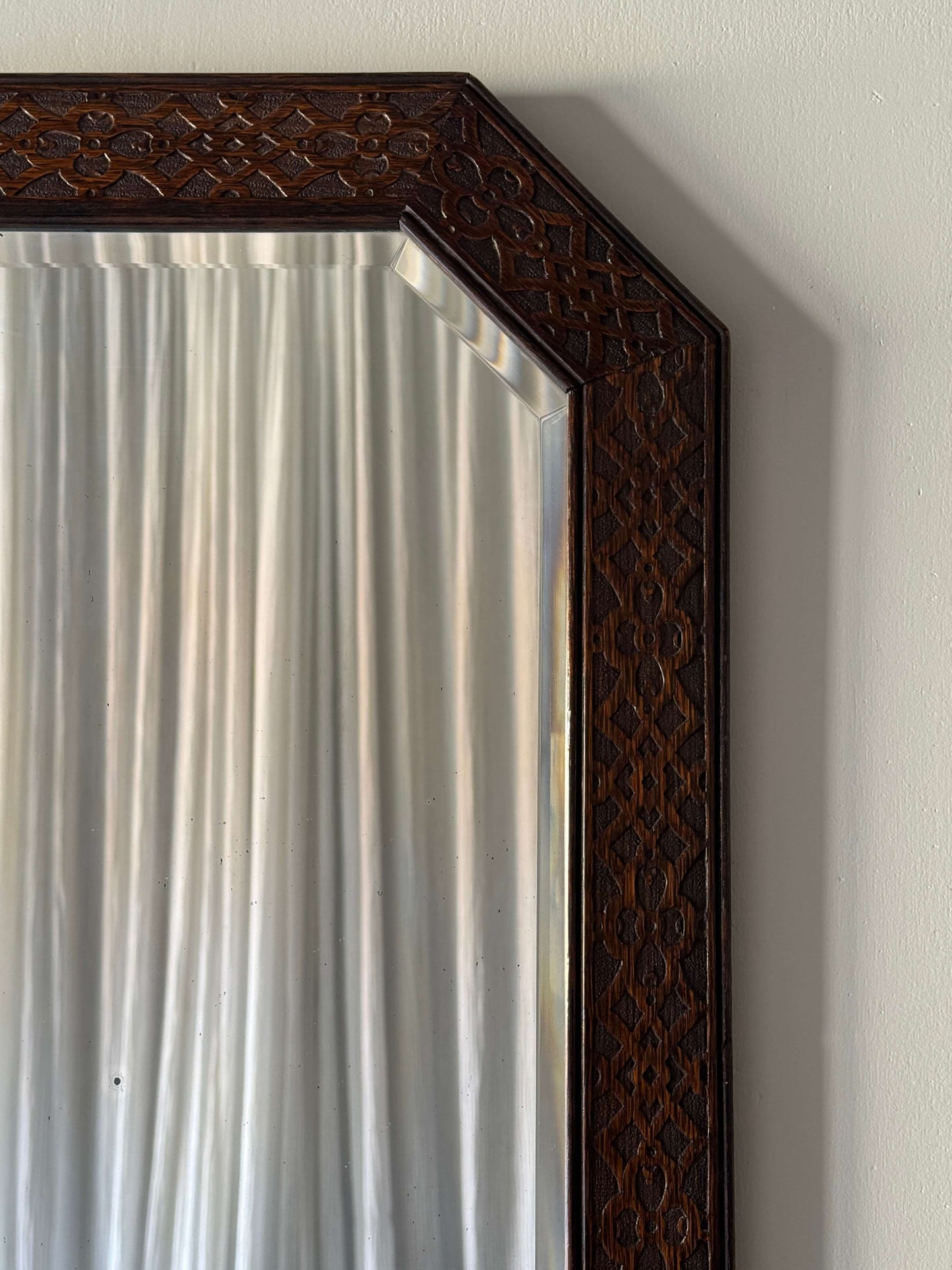 Edwardian oak-carved mirror