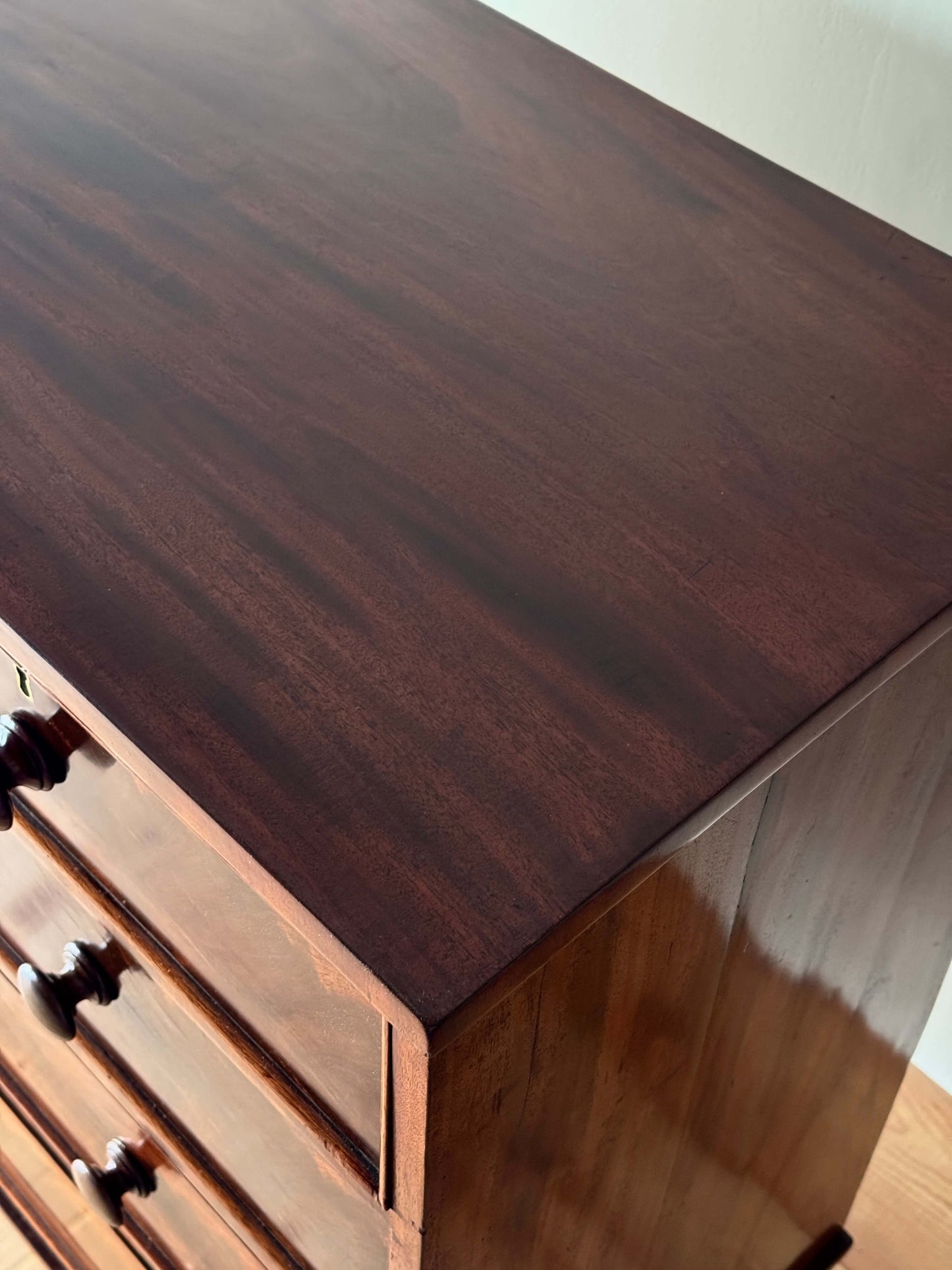 Victorian mahogany chest of drawers raised on turned feet