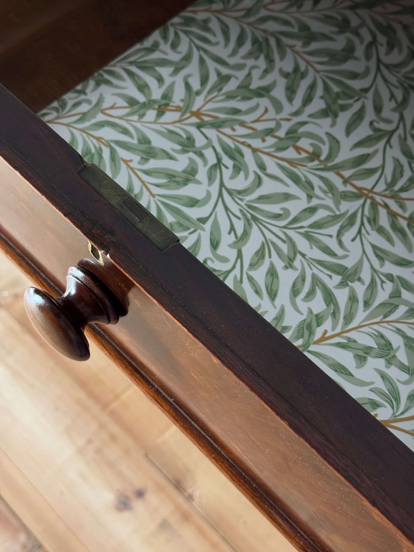 Victorian mahogany chest of drawers raised on turned feet