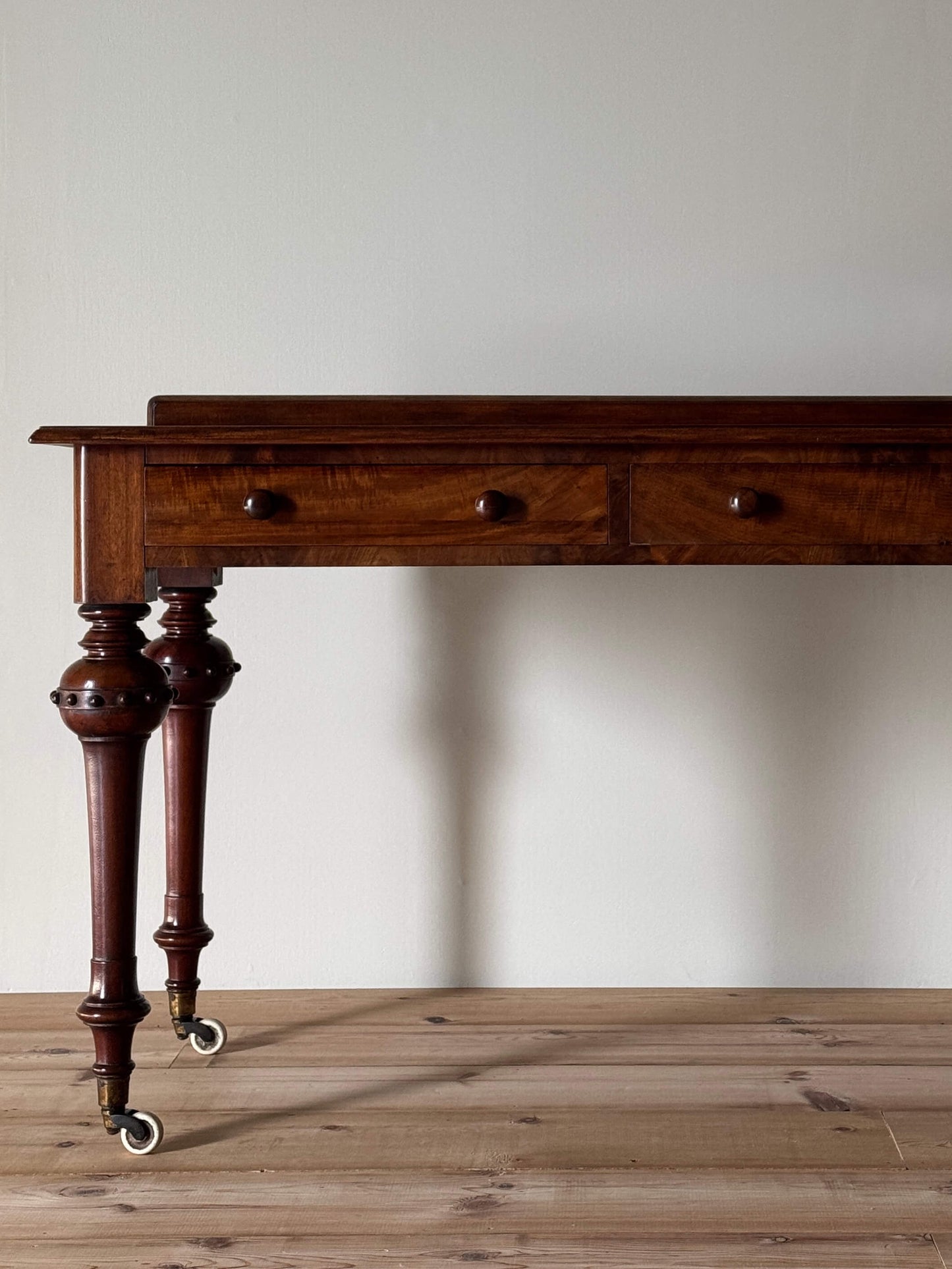 Victorian mahogany desk on casters