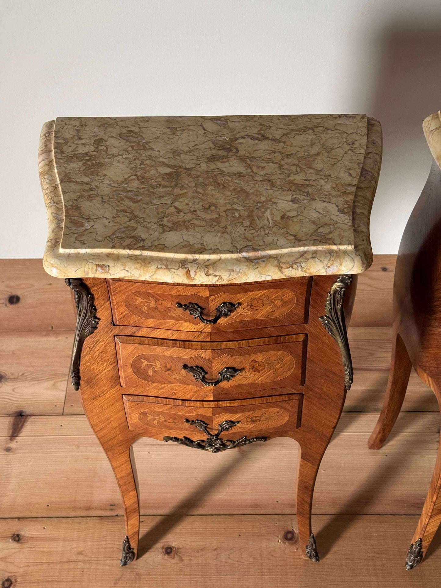 Pair of French antique marquetry bedside tables with marble tops