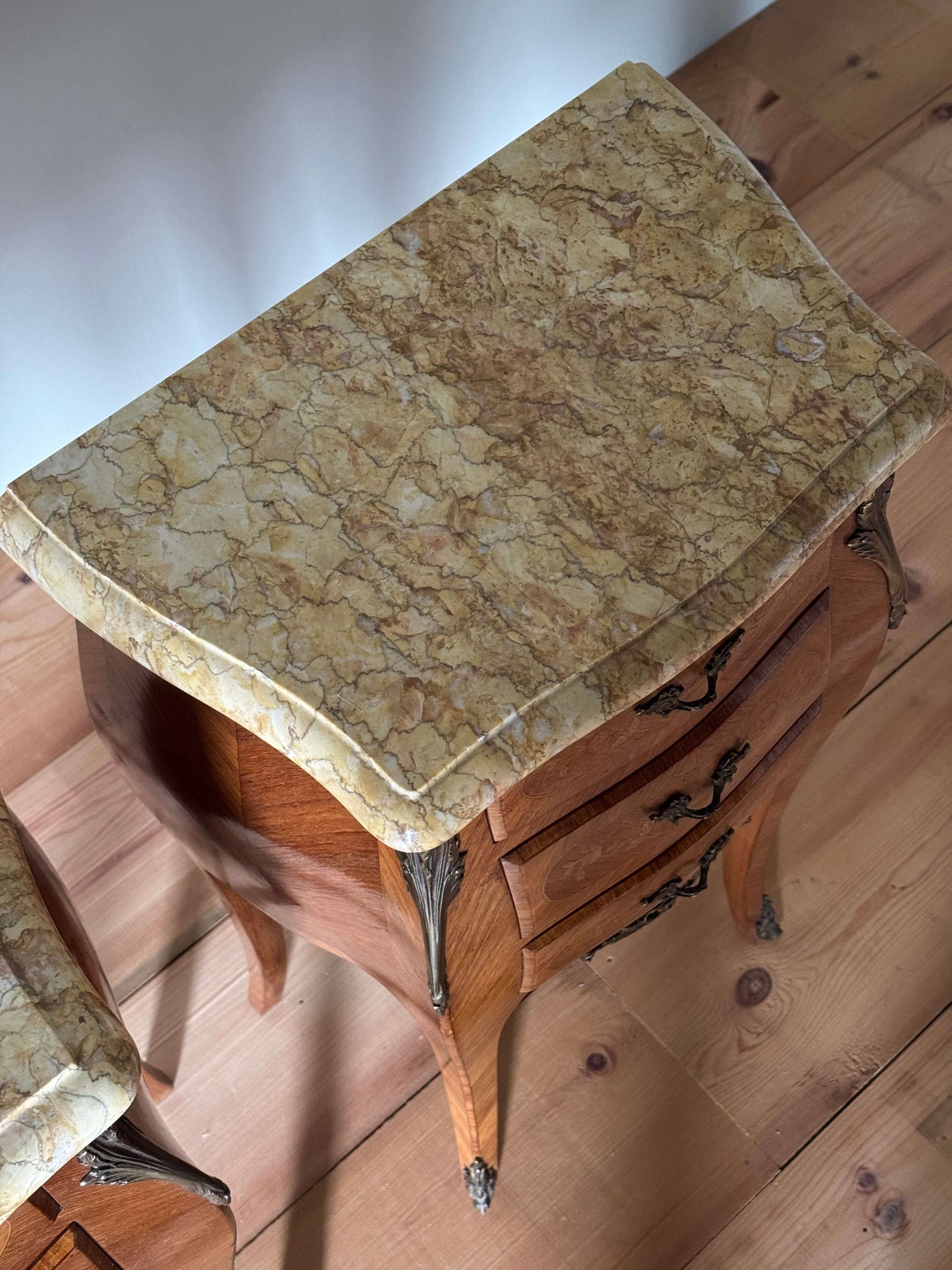 Pair of French antique marquetry bedside tables with marble tops