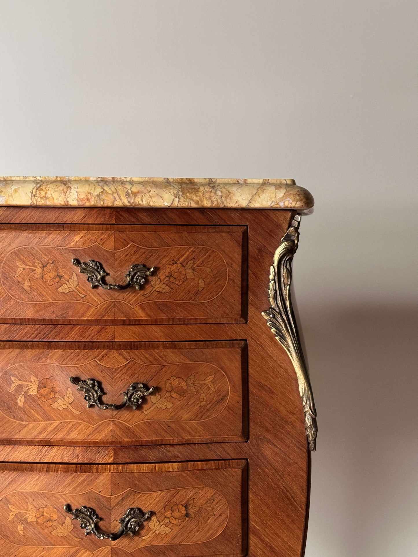 Pair of French antique marquetry bedside tables with marble tops