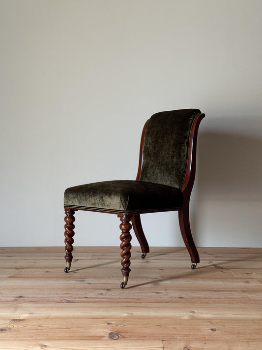 Antique occasional chair raised on barley twist legs