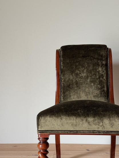 Antique occasional chair raised on barley twist legs