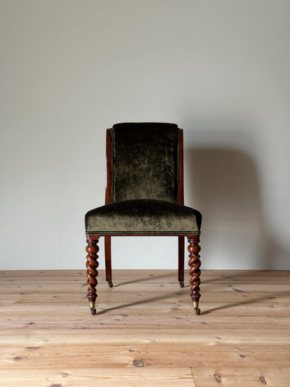 Antique occasional chair raised on barley twist legs