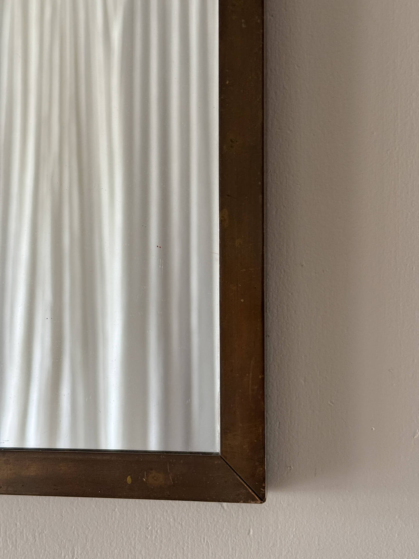 Aged brass vintage mirror