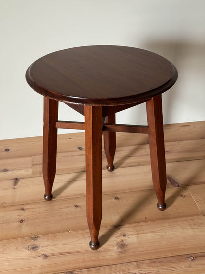Antique circular table with chamfered legs and ball feet