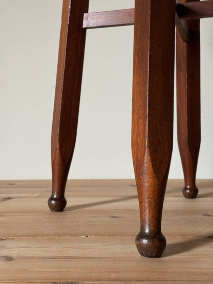 Antique circular table with chamfered legs and ball feet