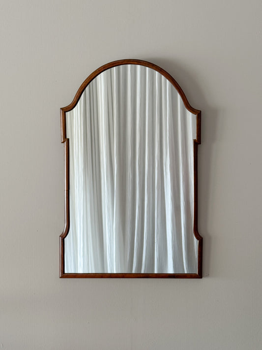 Antique mahogany curved mirror
