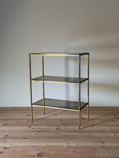 Mid-century brass and smoked glass shelving unit