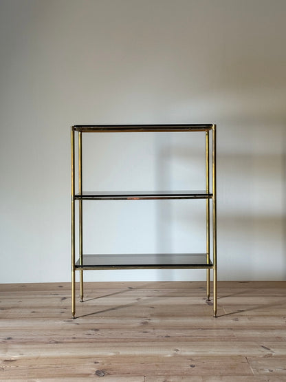 Mid-century brass and smoked glass shelving unit