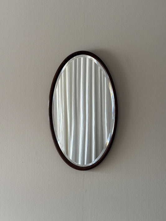 Victorian mahogany oval mirror