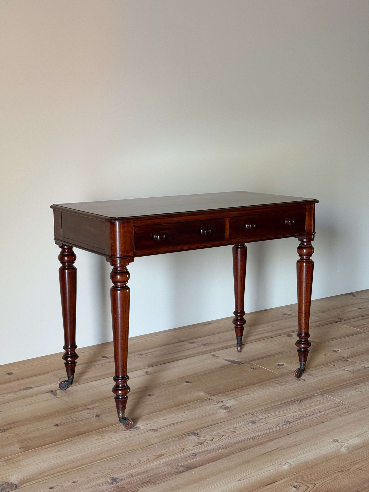 Victorian mahogany desk on ceramic castors