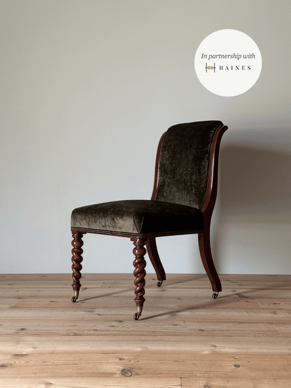 Antique occasional chair raised on barley twist legs