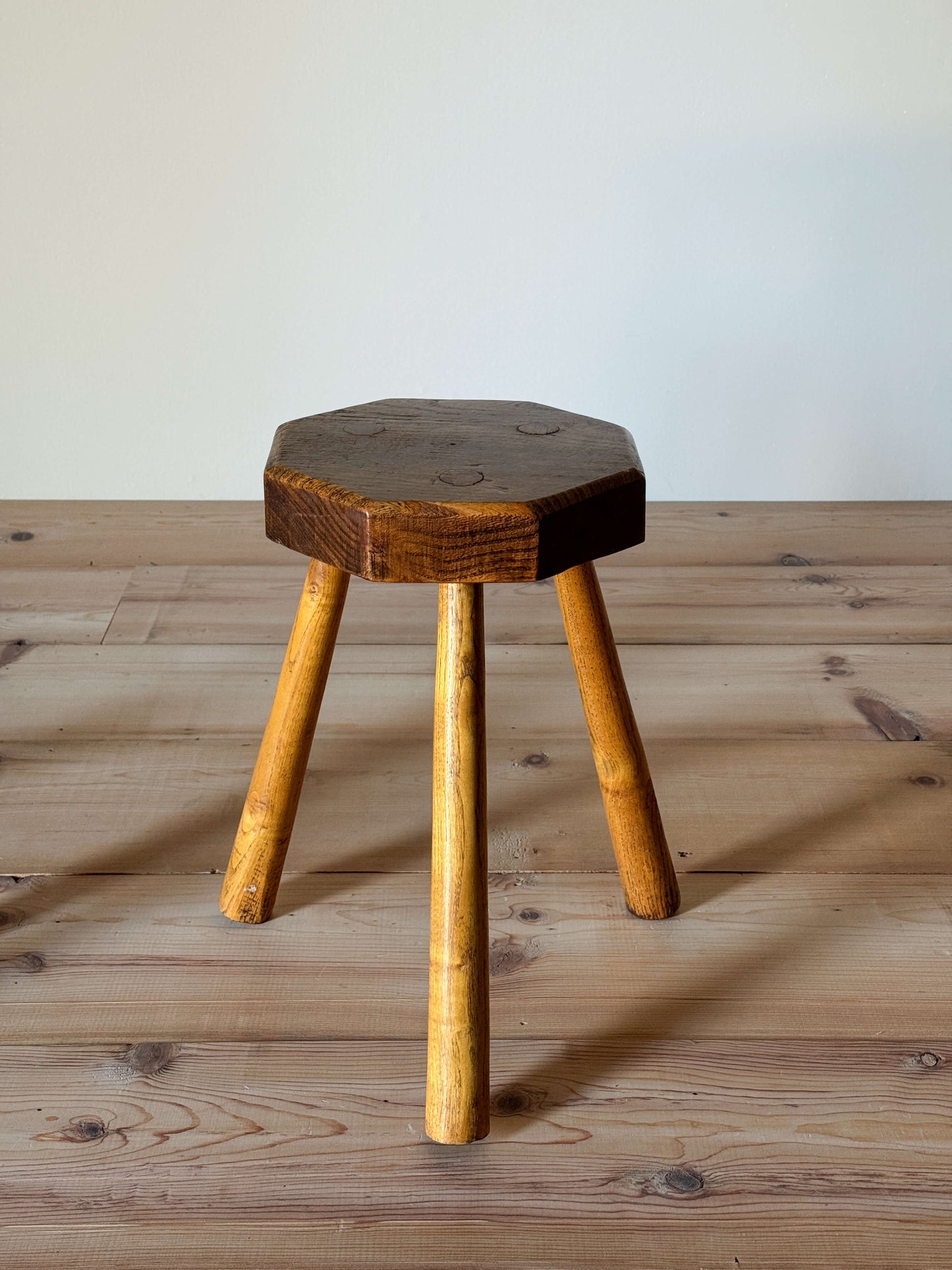 Pair of vintage elm tripod stools