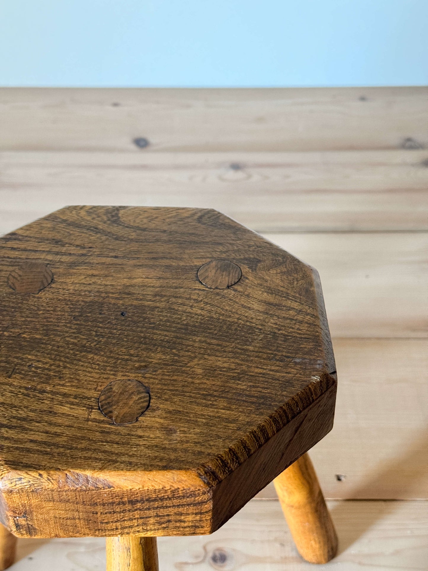 Pair of vintage elm tripod stools