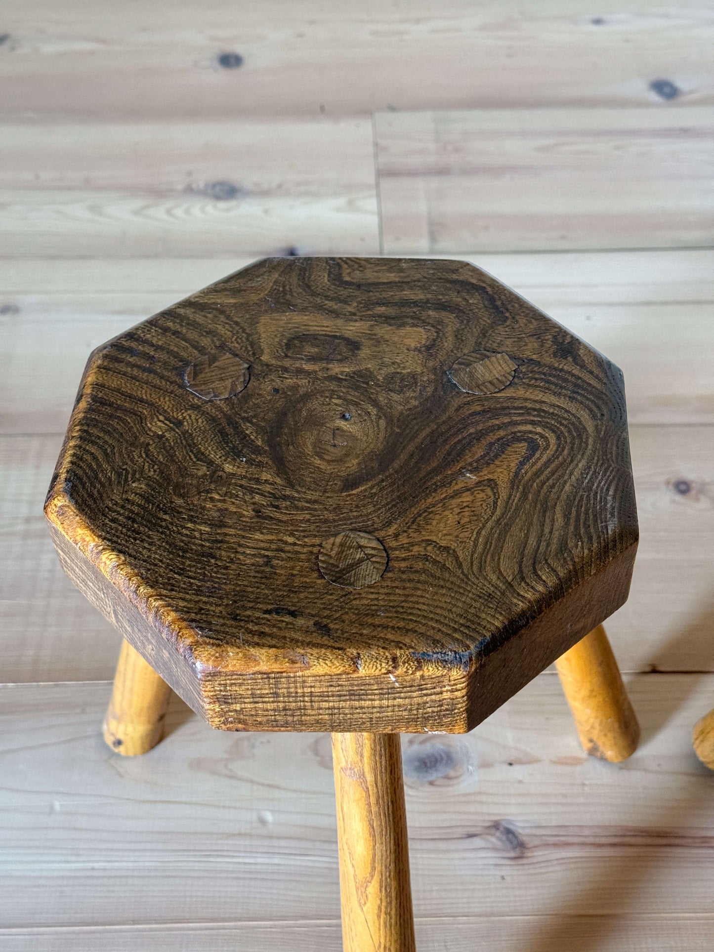 Pair of vintage elm tripod stools