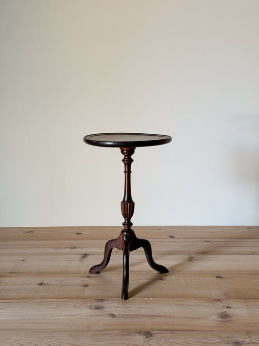 Vintage mahogany wine table on splayed legs