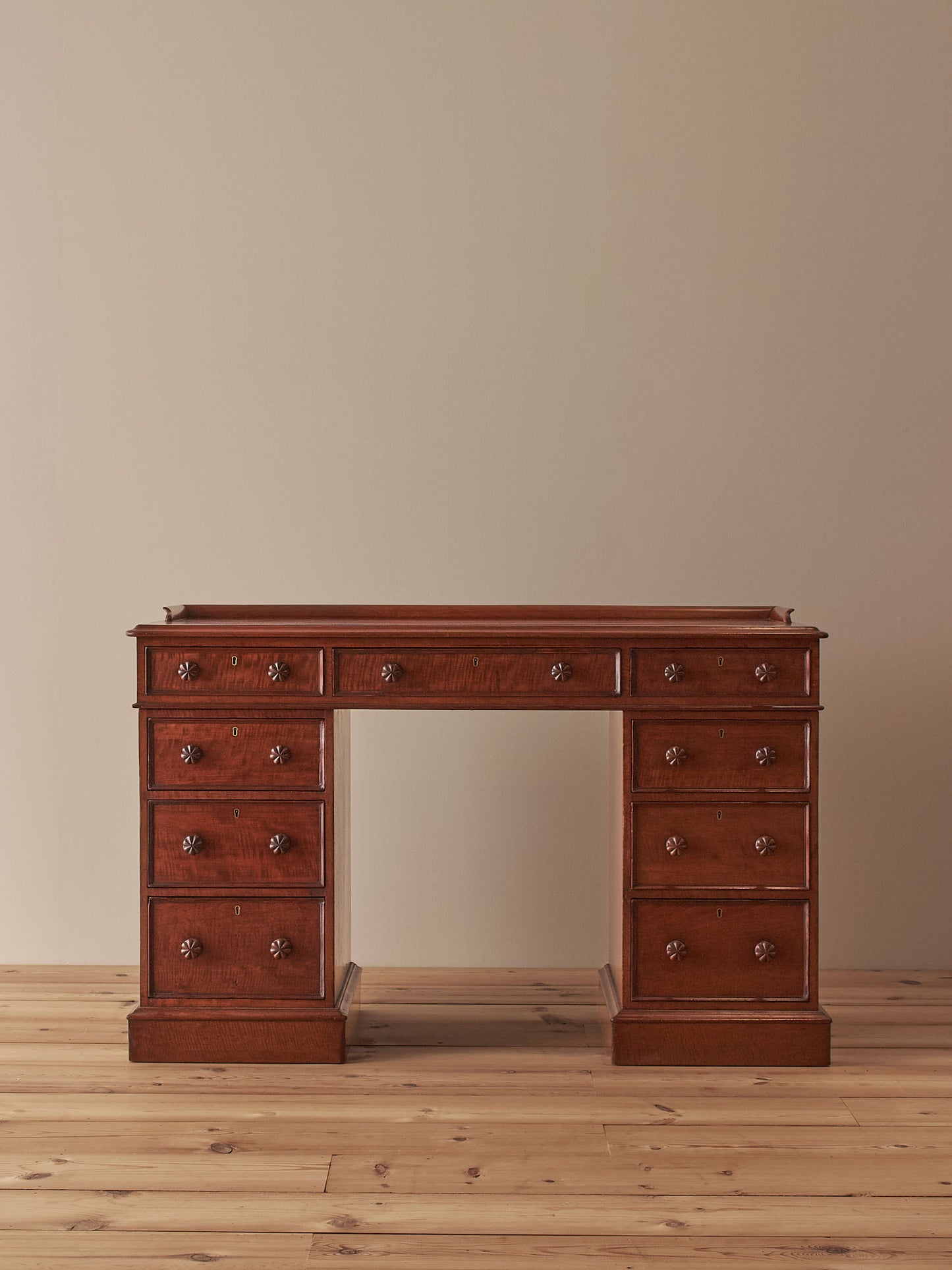 Regency mahogany fiddleback twin pedestal desk
