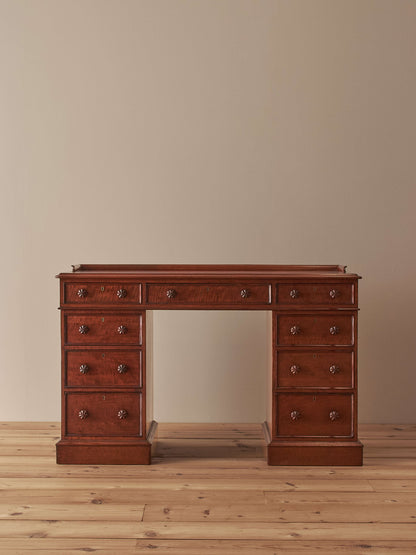 Regency mahogany fiddleback twin pedestal desk