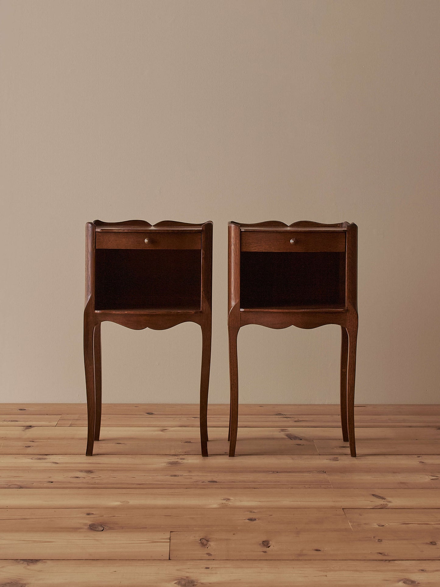 Close-pair of vintage French bedside tables