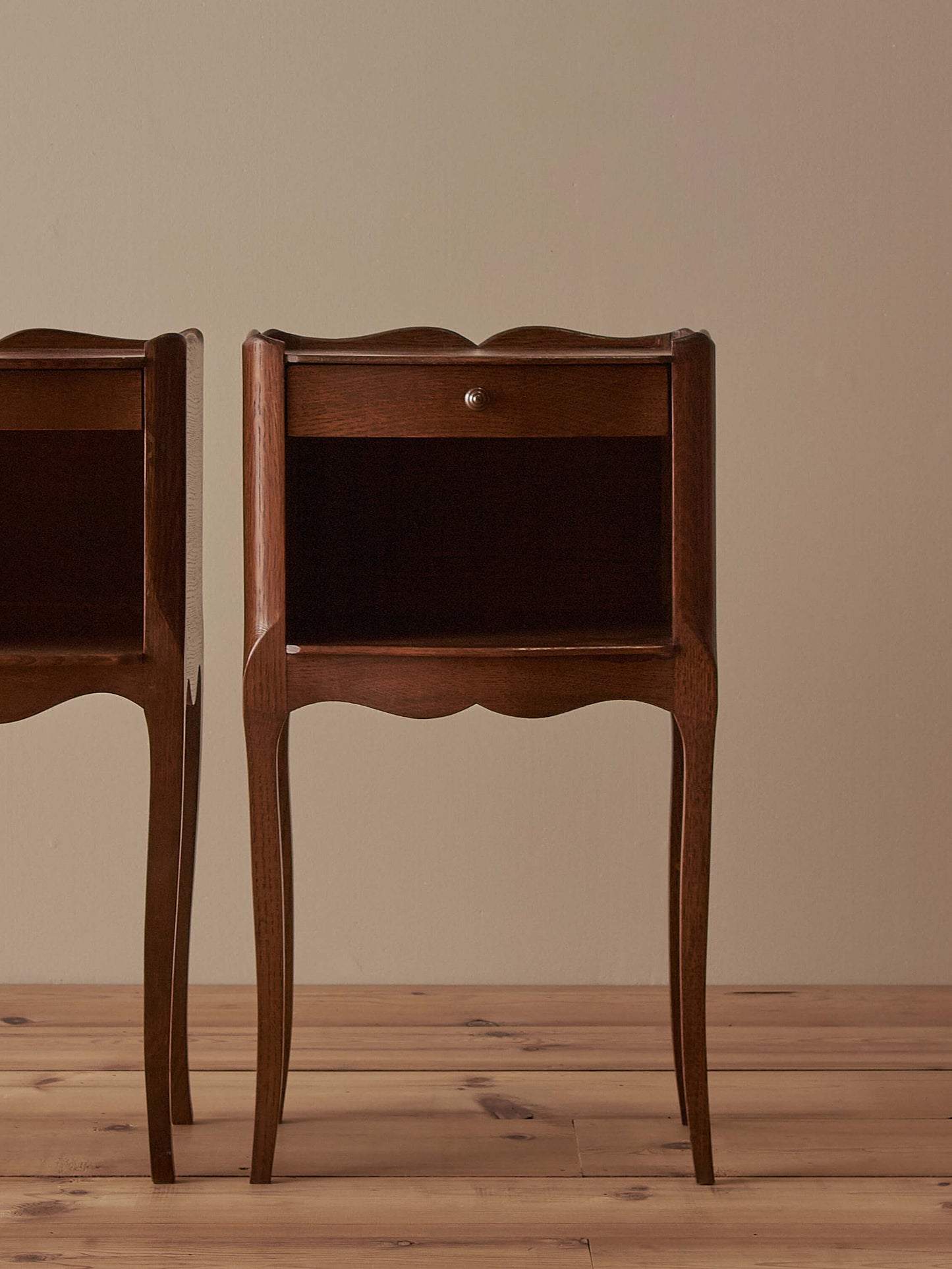 Close-pair of vintage French bedside tables