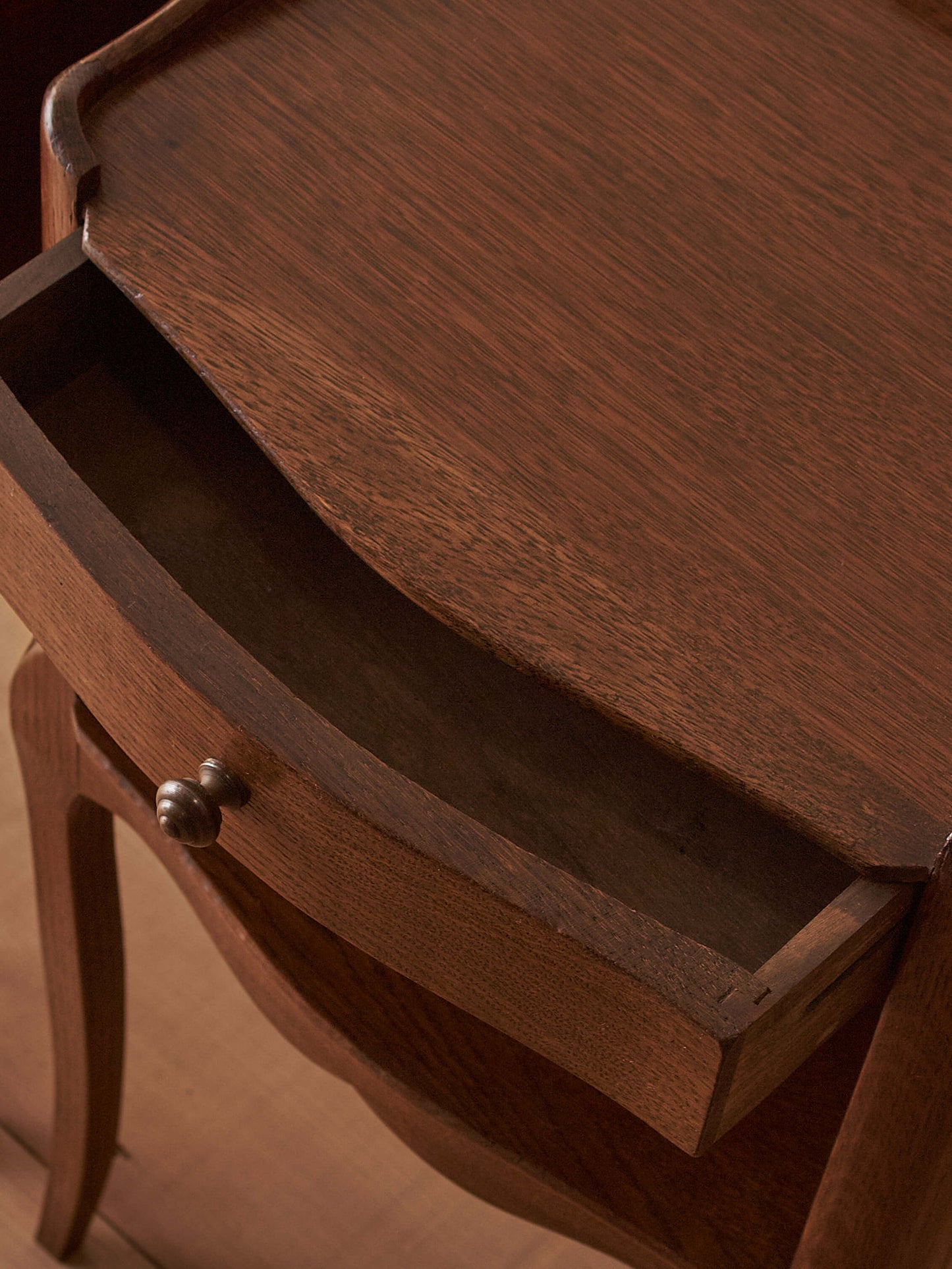 Close-pair of vintage French bedside tables