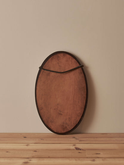 Antique oak oval mirror with circular details