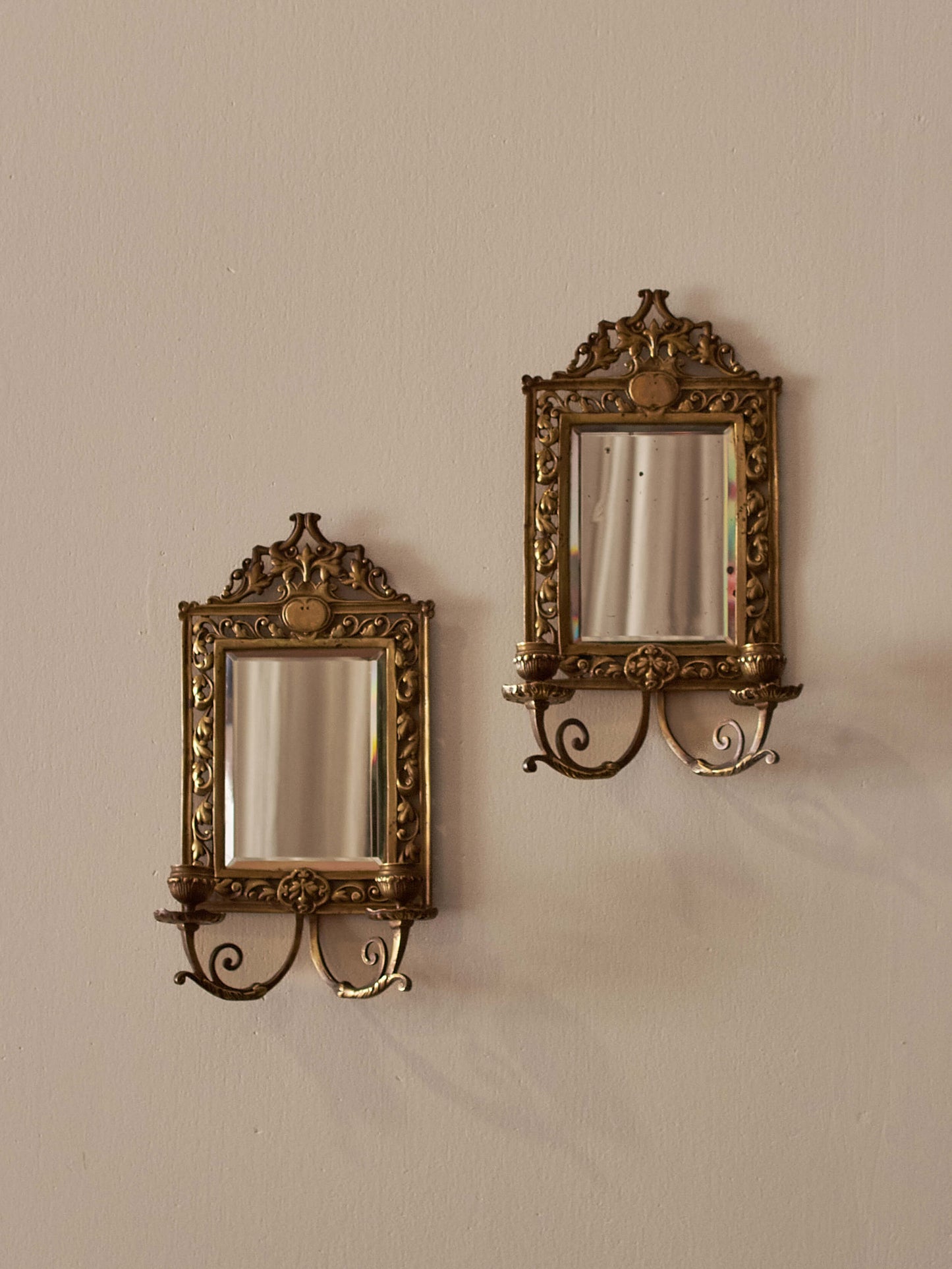 Pair of French antique brass candle sconces