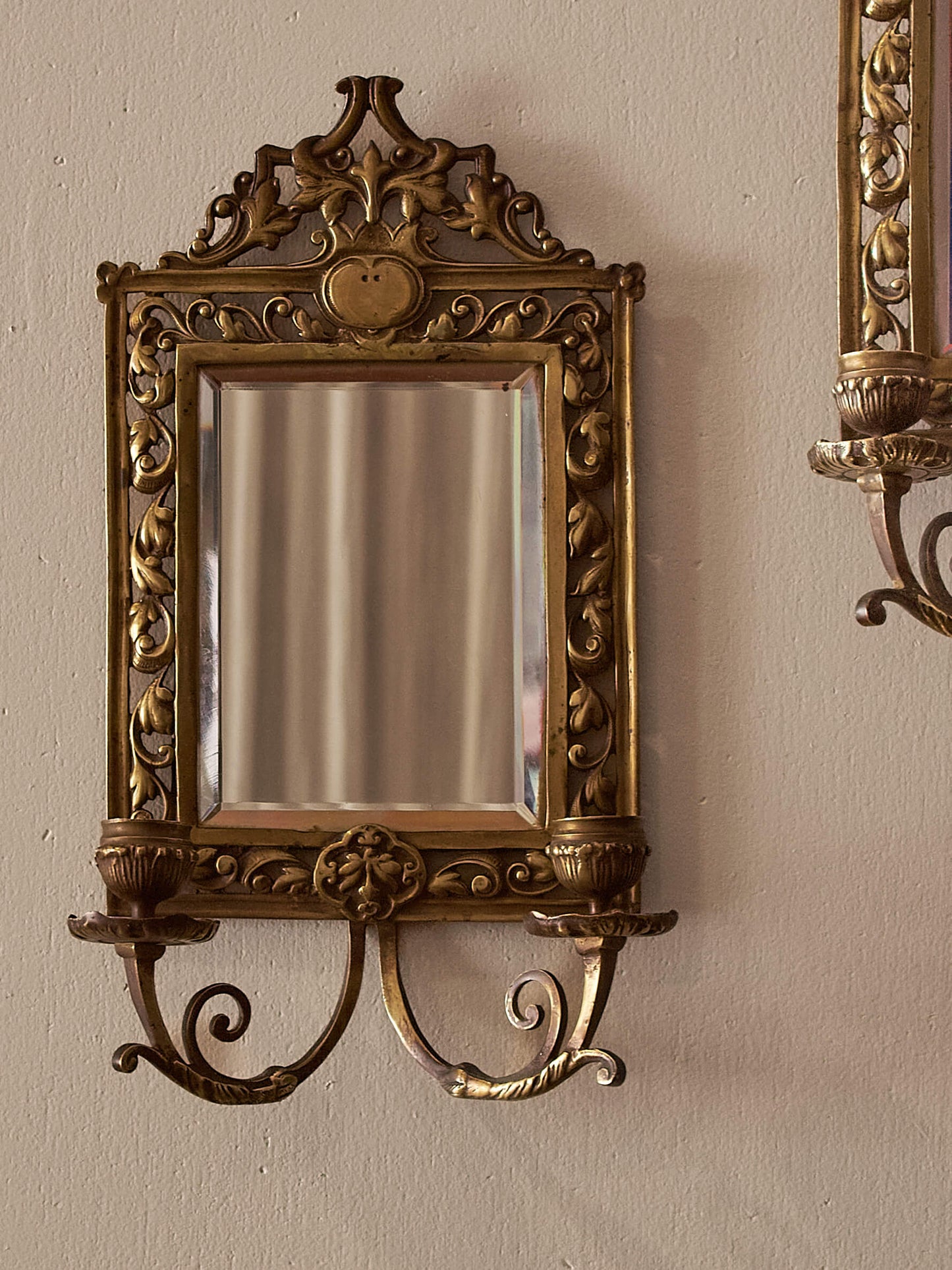 Pair of French antique brass candle sconces