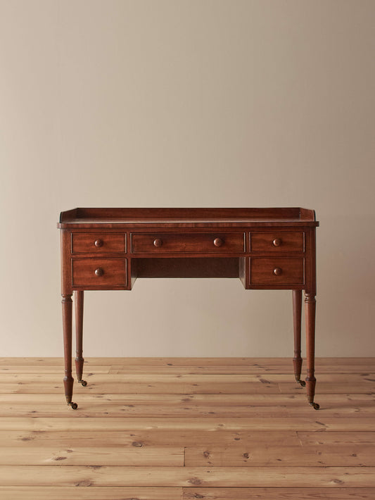 ON HOLD Antique Victorian mahogany writing desk on castors