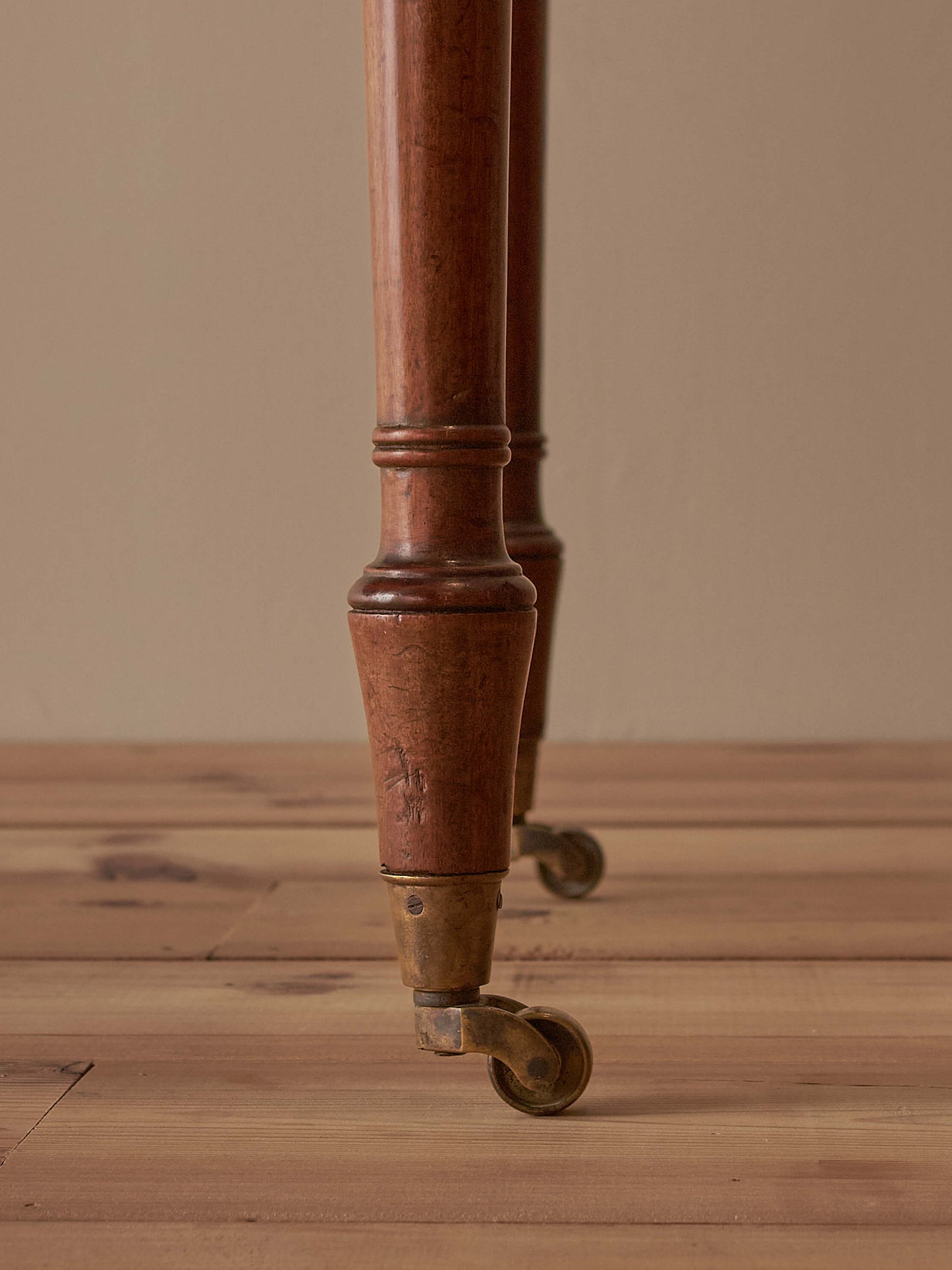 Antique Victorian mahogany writing desk on castors