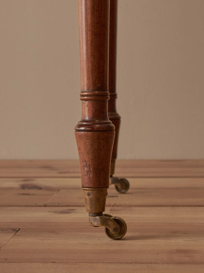 Antique Victorian mahogany writing desk on castors