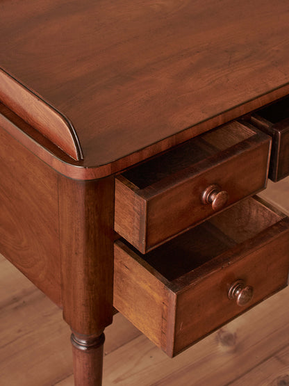 Antique Victorian mahogany writing desk on castors
