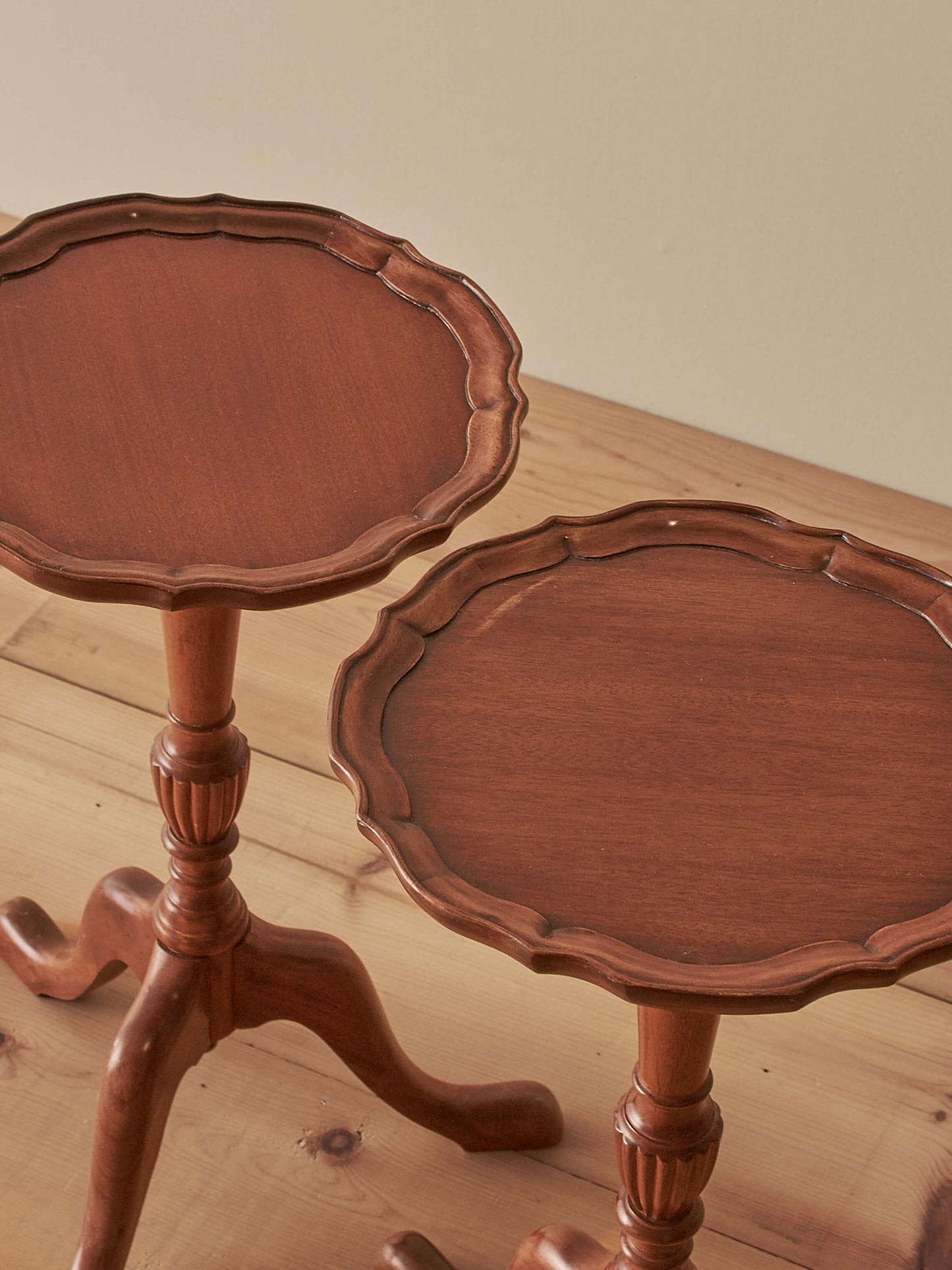 Pair of vintage mahogany scalloped wine tables
