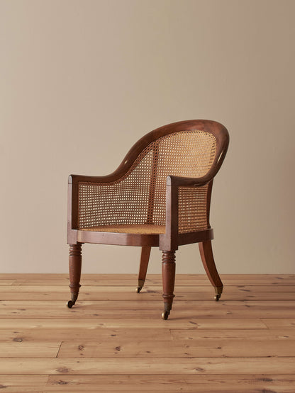 Antique Regency mahogany bergère chair