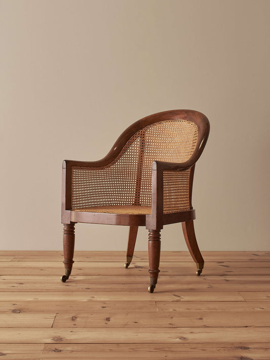 Antique Regency mahogany bergère chair