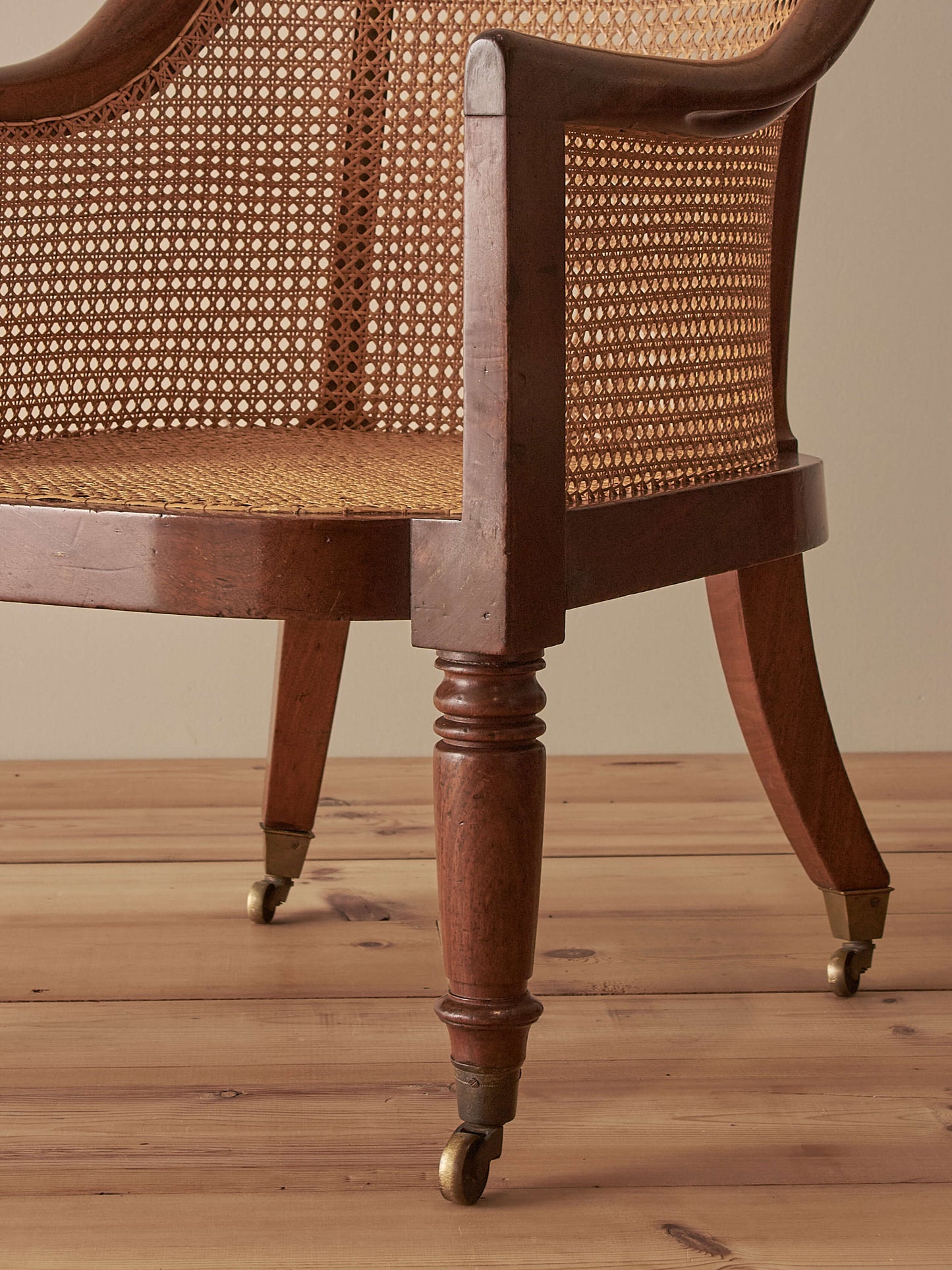 Antique Regency mahogany bergère chair
