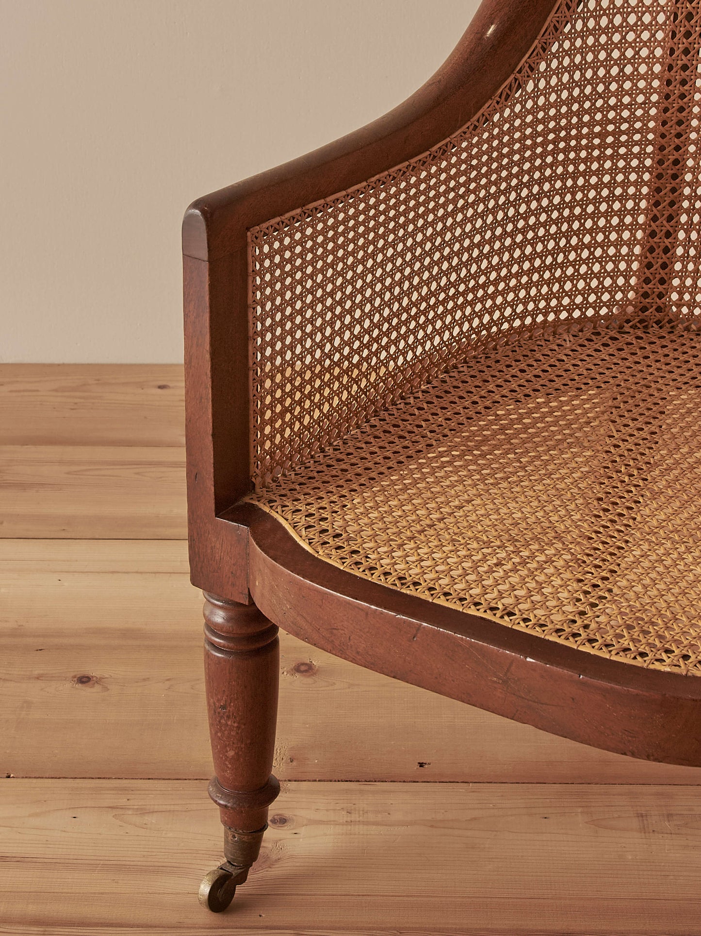 Antique Regency mahogany bergère chair