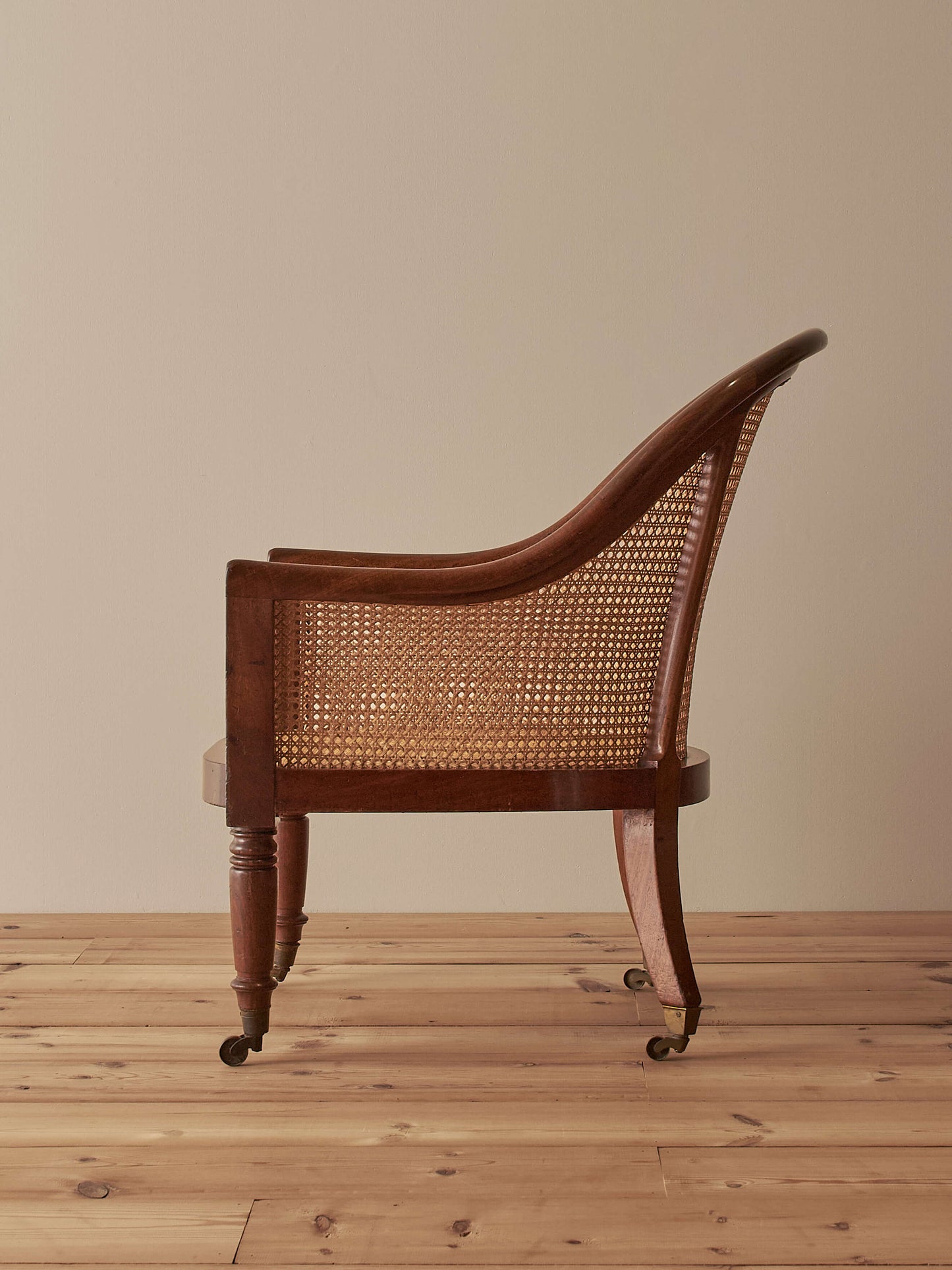 Antique Regency mahogany bergère chair